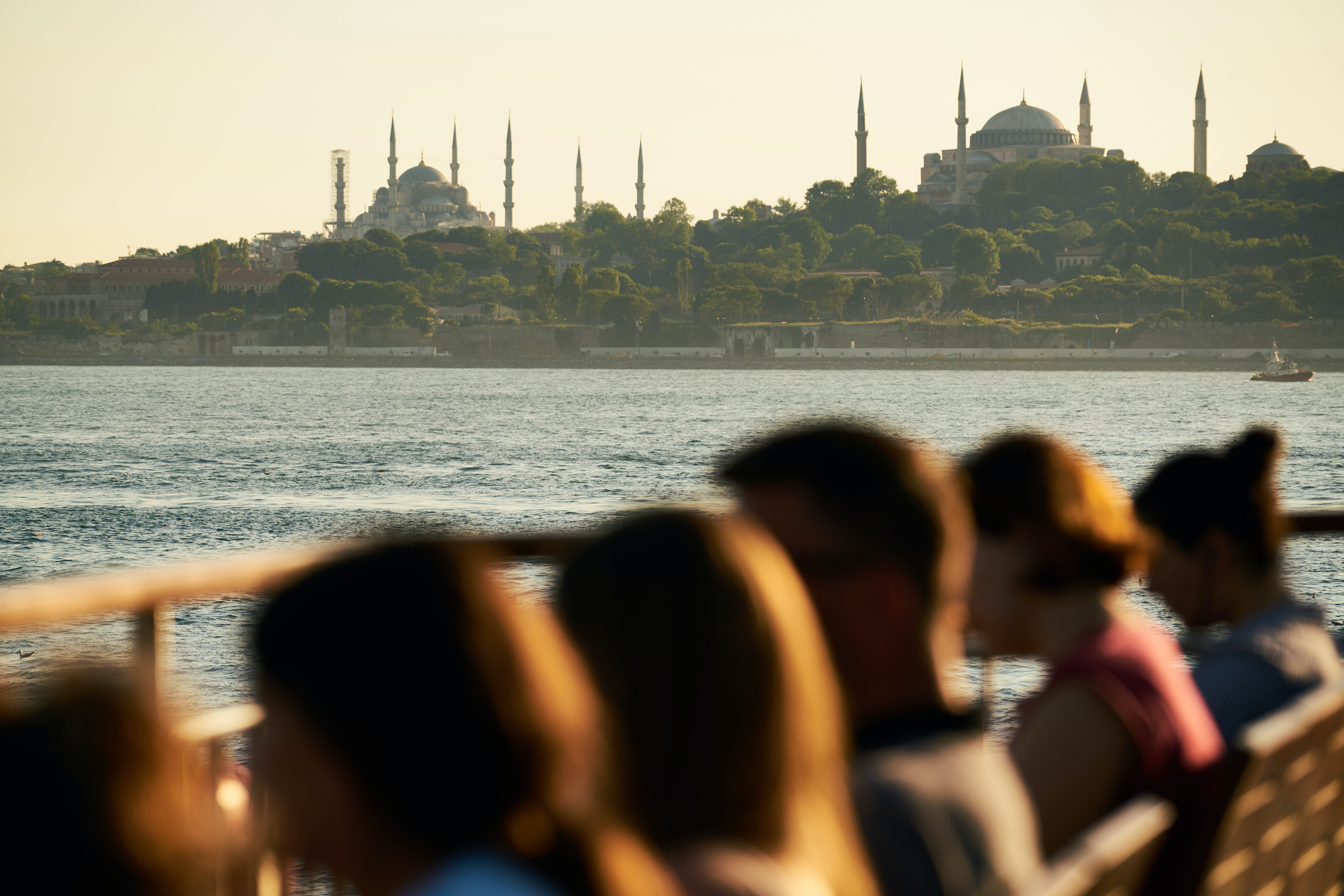 engin-akyurt-T1iVqLyqe5E-unsplash Foggy purple city with a teal sky.